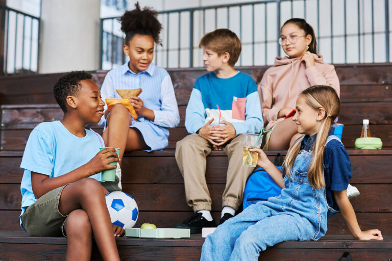 youthful-intercultural-school-friends-with-soda-lo-2025-03-08-07-48-49-utc-web